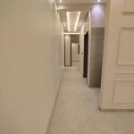 The first floor of Al-Jenadriyah, Al-Ghusoon plan, T elevator for passengers, two entrances, men's majlis with sinks and a bathroom, spacious hall, kitchen, 4 bedrooms, including one master with a bathroom serving the rest of the rooms, area of 199.